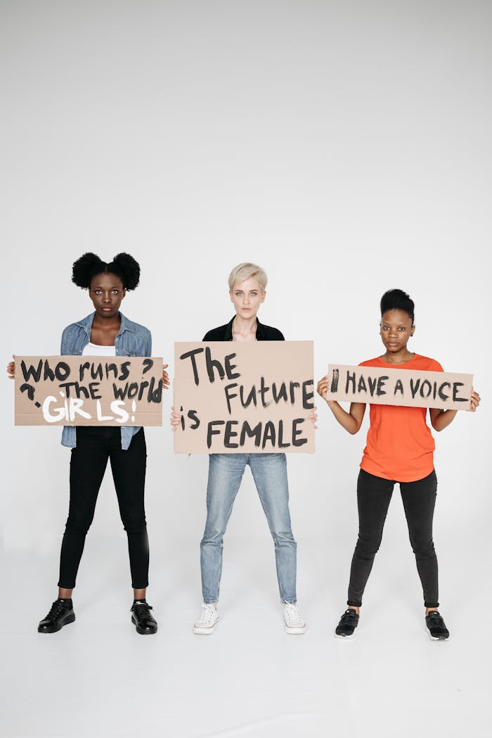 Women Standing Holding Placards